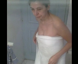 Mature Indian milf filmed naked in shower